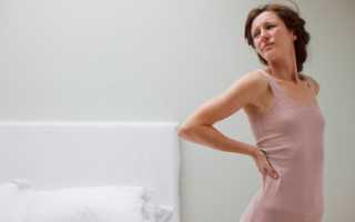 Болит спина посередине при месячных