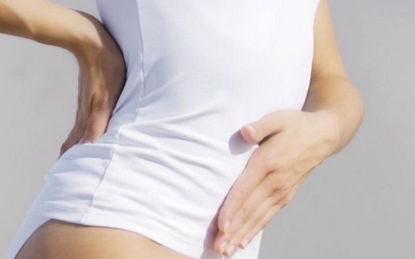 Боли в области живота – самый неприятный симптом развития различных болезней позвоночника